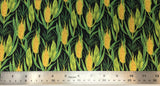 Flat swatch corn on cob printed fabric in black (black fabric with repeated corn on cob pattern in yellow and green)