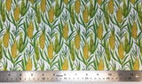Flat swatch corn on cob printed fabric in white (white fabric with repeated corn on cob pattern in yellow and green)