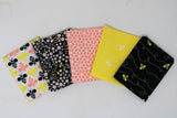 Fanned 5pc precuts in style "Beyoutiful" (white with black, yellow and pink bees, black with busy tossed floral in white, pink and yellow, white with pink large floral petal/heads allover, yellow with white bees and dotted travel lines, black with yellow bees and white travel lines)