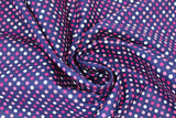 Swirled swatch Swiss Dot fabric (navy fabric with white, light, medium and dark pink small polka dots allover)