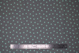 Flat swatch Gray Dot fabric (medium grey fabric with mint coloured dots allover)
