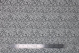 Flat swatch Dalmatian fabric (white fabric with small black dots pattern)