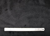 Flat swatch black fluffy fabric