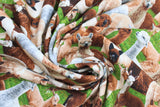 Swirled swatch Farm Animals fabric (realistic style collaged white and brown llamas with green grass)