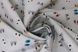 Swirled swatch footprints fabric (grey fabric with tiny subtle brown footprint mark lines allover and medium sized tossed assorted foot prints in grey, white, pink, yellow, blue)