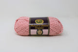 Ball of boucle yarn in strawberry (pale rose pink)
