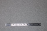 Flat swatch stone fabric (grey fabric with tiny darker grey dots with white highlights allover)