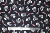 Flat swatch black born to ride fabric (black distressed look fabric with tossed white skulls and roses, red hearts with white wings)