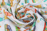 Swirled swatch Bookshelf Kitties White fabric (white fabric with busy tossed cartoon style kitties in various colours with book stacks)