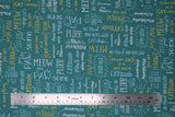 Flat swatch Words Blue fabric (turquoise blue fabric with tossed cat-related words and phrases allover in multi directions and various colours: "CATitude" "Purr-fect" etc.)