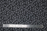 Flat swatch Kitty Faces fabric (black fabric with tossed illustrative style white kitty heads allover)