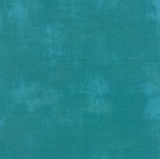 Grunge distressed-look fabric swatch in pale medium turquoise shade