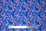 Flat swatch dragonflies blue fabric (dark blue fabric with tossed medium size pink and blue dragonflies with tiny pink and blue floral heads throughout)