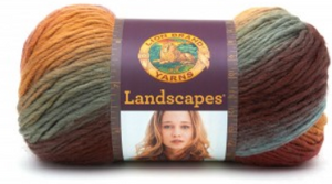 A ball of Lion Brand Landscapes yarn on white background in colourway tropics (orange, purple, fuchsia, olive, grey, blue)