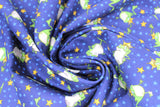Swirled swatch magical themed printed fabric in print frog prince (dark blue fabric with tiny light blue stars tossed and cartoon green frogs with gold crowns and gold stars)