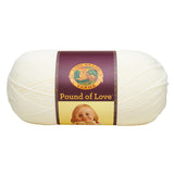 A ball of Lion Brand Pound of Love yarn on white background in an off white shade