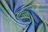 Swirled swatch blue fabric (teal and light blue faded vertical stripes with mermaid scale pattern allover)