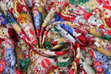 Swirled swatch Kitties Stack fabric (busy collaged kittens and christmas decorations fabric)