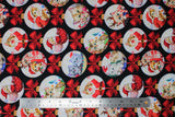 Flat swatch Ornaments fabric (black fabric with circular white ornaments allover with red bows, kitten graphics within bulbs in Christmas themed scenes with multi coloured hats, candies, trees, etc.)