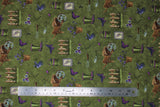Flat swatch Moss fabric (dark green fabric with small tossed garden related emblems allover in full colours: purple/green boots, purple flowers and butter flies, brown fences and wheel barrows, assorted garden tools, etc.)