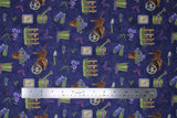 Flat swatch garden tools fabric (dark purple fabric with small tossed full colour garden related emblems allover: green and purple gloves, green watering can, brown wheel barrow, purple and green floral, garden tools, butterflies, etc.)