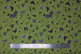 Flat swatch Celery II fabric (medium green fabric with loosely tossed purple and green floral and greenery allover in various styles)