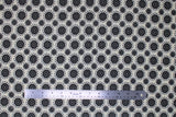 Flat swatch floral linen fabric (off white fabric with black circular floral dots allover with smaller black dots around)