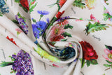 Swirled swatch parchment bouquets fabric (beige fabric with full colour small bouquets of floral allover with small grey cursive labels)