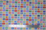 Flat swatch multi stamps fabric (beige fabric with tiled colourful vintage style stamps allover)