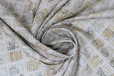 Swirled swatch parchment stamps fabric (beige fabric with tiled neutral vintage style stamps allover)