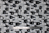 Flat swatch Friends fabric (stacked cartoon/illustrative style cats, bears, hedgehogs etc in black and white shades)
