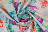 Swirled swatch butterflies fabric (light teal marbled look fabric with pink, red and orange cross hatch look marks allover and large tossed watercolour floral look butterflies in blue, purple, orange, teal, red)