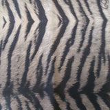 Alternating rows of shallow chevron animal stripe prints