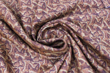 Swirled swatch Treats fabric (packed/tossed dog bones allover in brown shade)