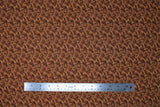Flat swatch Treats fabric (packed/tossed dog bones allover in brown shade)