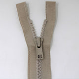 55cm medium weight one way separating activewear zipper in natural half zipped
