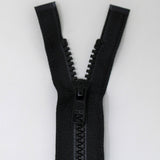 60cm medium weight one way separating activewear zipper in black half zipped