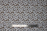 Flat swatch Eggs fabric (tons of tossed white eggs with nest bits in background)