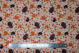 Flat swatch Dark Cream fabric (cream fabric with collaged sleepy forest animals and red, orange, yellow and green fall leaves in various styles)