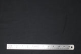 Flat swatch poly/cotton blend solid fabric in shade black