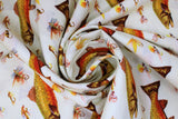 Swirled swatch River Trout fabric (white fabric with assorted style fishing flies in natural shades: brown, beige, yellow etc. and large repeated river trout in brown/green and orange tones)