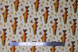 Flat swatch River Trout fabric (white fabric with assorted style fishing flies in natural shades: brown, beige, yellow etc. and large repeated river trout in brown/green and orange tones)