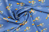 Swirled swatch Star Wars licensed print fabric in Retro Millennium Falcon