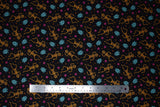 Flat swatch tossed sugar droids fabric (black fabric with tossed small blue drawing style R2D2s and orange CEPOs with tossed orange and pink stars and flowers)