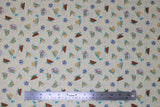 Flat swatch licensed Star Wars (The Child) printed fabric in Child Doodle Toss (baby yoda in dark and light cloaks, trooper, and pod on white)