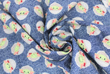 Swirled swatch licensed Star Wars (The Child) printed fabric in Child Toss on Denim (baby yoda circle pattern on denim look fabric)