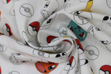 Swirled swatch pokemon printed fabric (white fabric with lines of poke balls, bulbasaur heads, pikachu heads, charizard heads, both in full colour and in outline only)