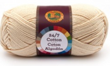 A single ball of Lion Brand 24/7 Cotton in Ecru