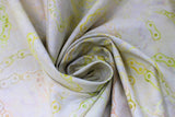 Swirled swatch - Natural Chain fabric (neutral marbled look fabric with subtle rainbow effect bike chain allover)