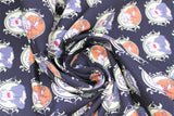 Swirled swatch licensed Muppets printed fabric in Waldorf and Statler (tiled muppets in frames on black)